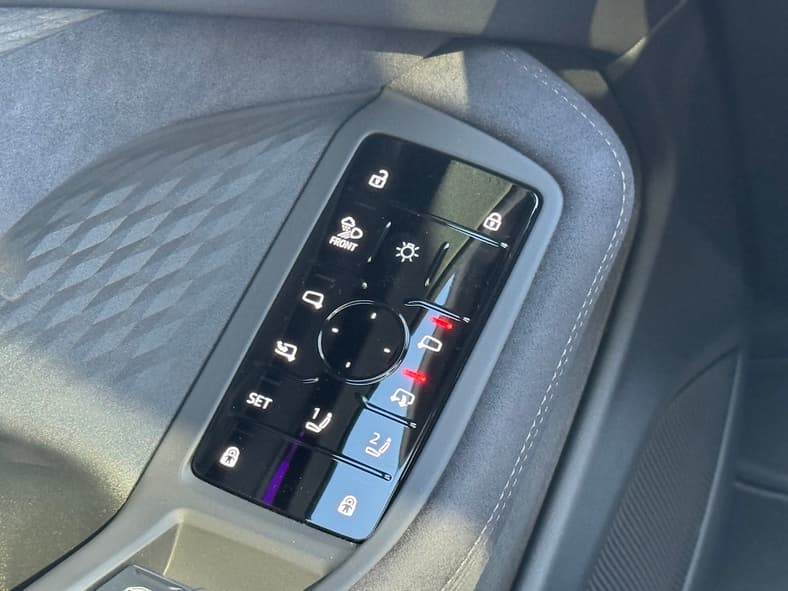 The Driver'S Side Door Panel Controls Include Lights, Mirrors, Seat Memory And Child Locks In The Audi A6