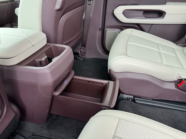 Rear Seat Passengers Have Their Own Cup And Cubby Storage