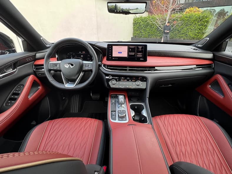 The Front Cabin And Red Leather Seating In The 2027 Infiniti Qx65