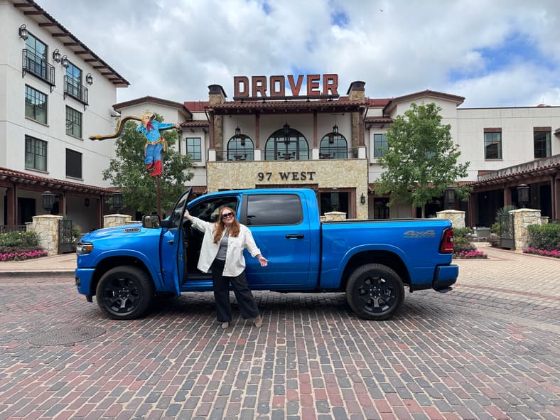 Natalie Standing With The 2026 Ram 1500 Bighorn/Lone Star