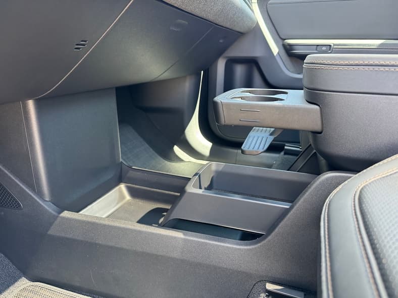 Rivian R2 Features A Floating Center Console With A Lower Storage Bin, Pop Out Cup Holder And A Storage Box