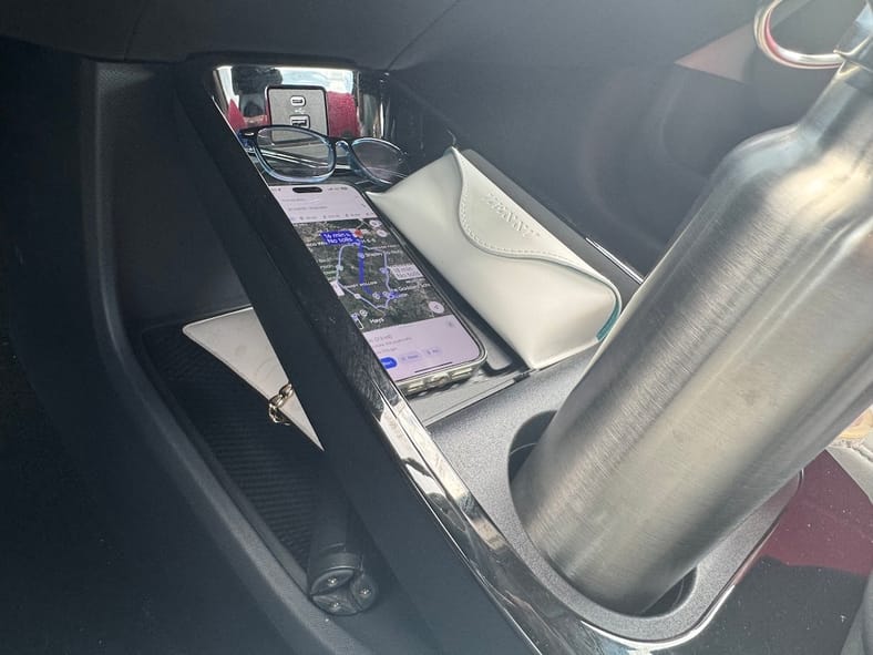 Putting the Ford Mustang Mach-E To the True Test By Driving it Like I Own It 7 The Center Console Of The Ford Mustang Mach-E With All My Stuff