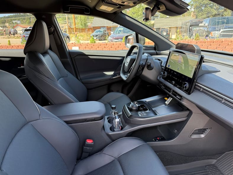 The Interior Of The 2026 Subaru Solterra From The Passenger'S Side