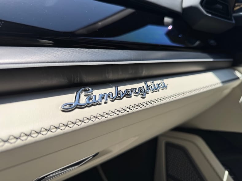 The Lamborghini Logo On The Dashboard