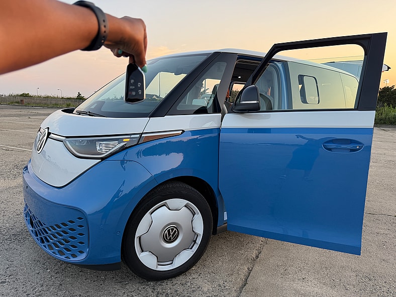 I Was Wrong All Along: The 2025 VW ID. Buzz Shows Minivans Can (And Should) Be Cool 11 Holding The Vw Id. Buzz'S Key Fob Up