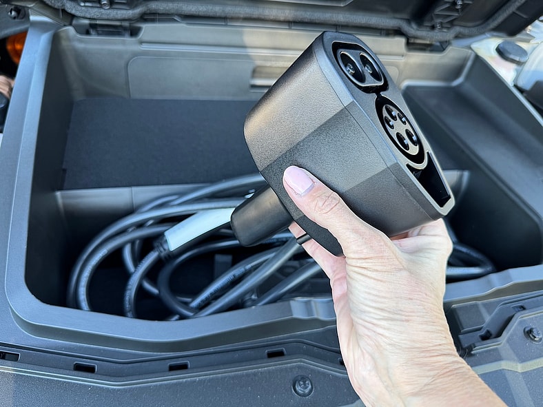 2025 Hyundai Ioniq 5 Long Term Test Drive: What It’s Like to Own and Drive This Popular EV 6 The Frunk Cargo Bin Is Loaded With Dual Charge Adapters And A Charge Cord