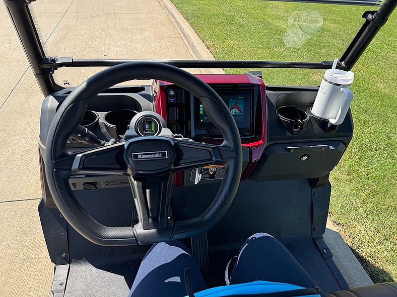 The Front Seat Of The Kawasaki Nav 4E Limited Electric Side By Side