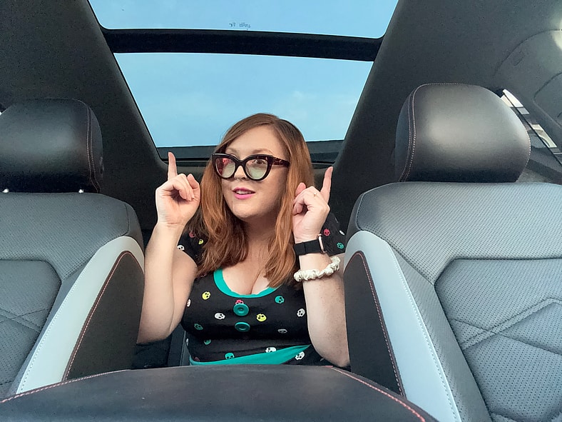 Natalie Sitting In The Second Row Of The 2025 Vw Atlas Peak Edition