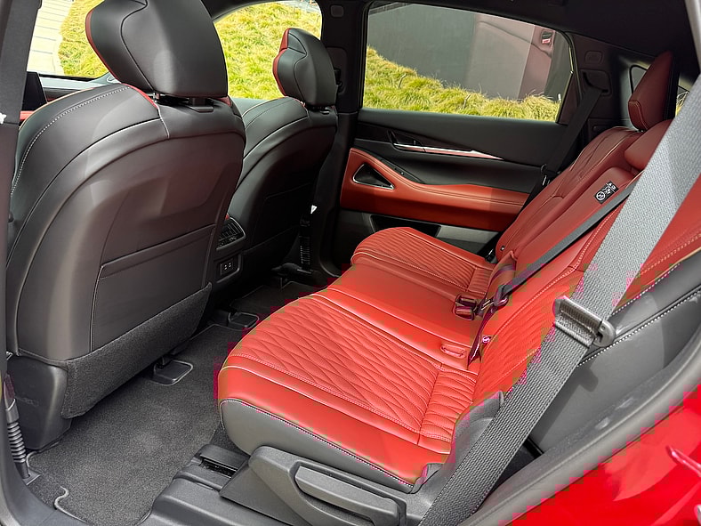 The First Ever Infiniti QX65 is Built To Spoil You. And It Just Might 6 The Spacious Rear Seat In The 2027 Infiniti Qx65