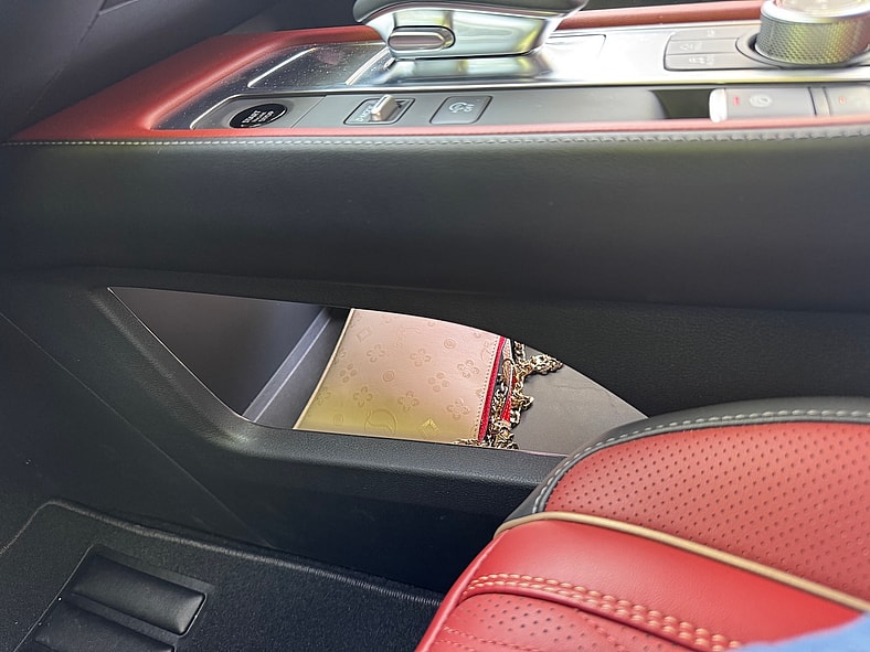 Under Console Storage Is Convenient In The 2027 Infiniti Qx65