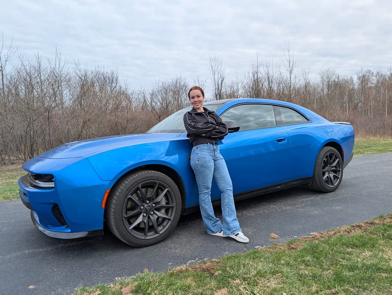 Shannon Standing With A Two-Door Version Of The 2026 Dodge Charger Sixpack Scat Pack