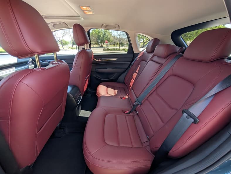 The Very Rear Seats Of The Cx-5 Carbon, Showcasing The Read Leather Seats