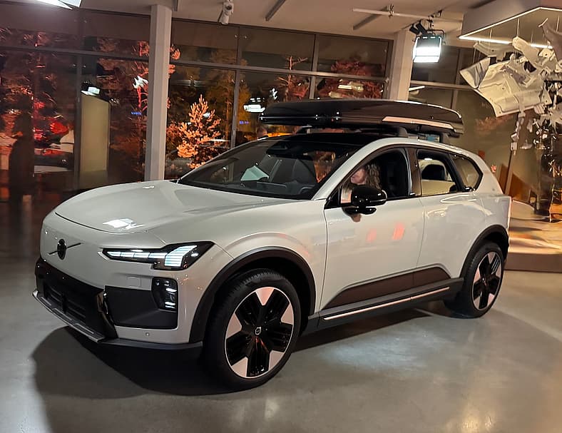 A Side View Of The Volvo Ex60 Cross Country. Notice The Door Handles Are Tiny And Tucked Just Under The Window Frame