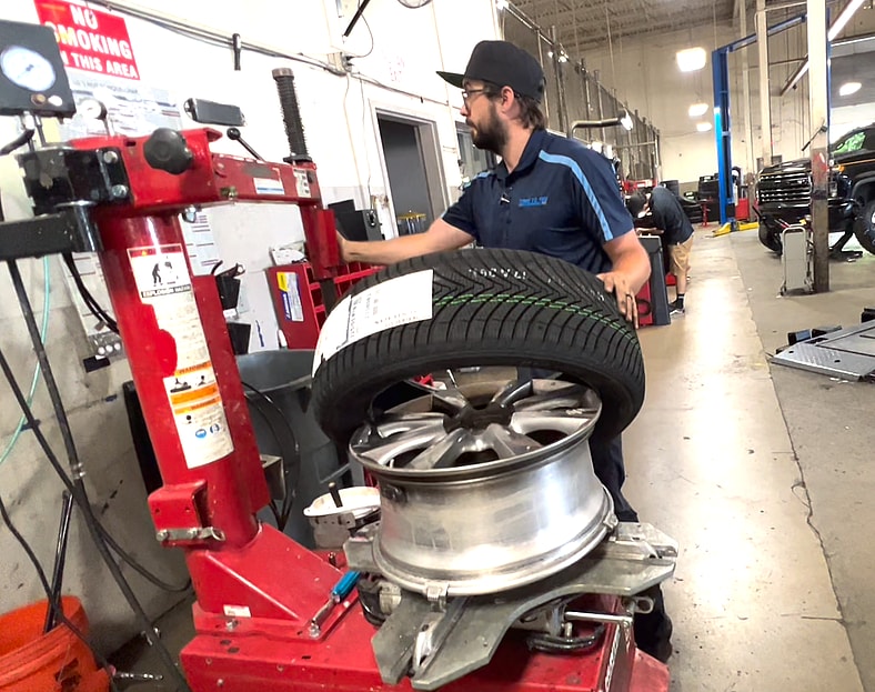 I Buy My Tires Exclusively From Costco, and Have for Years. Here's Why I Recommend it 4 The Kumho Tires Being Installed On My Car'S Wheels