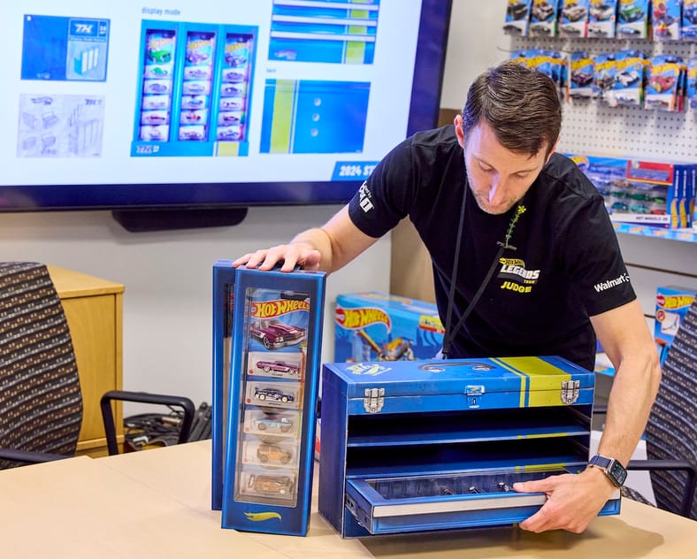Behind the Scenes at Mattel’s Hot Wheels Design Center Is as Magical As You'd Imagine 9 Matt Gabe, Manager, Packaging Design, Shows Off The Hot Wheels Super Treasure Hunt Packaging