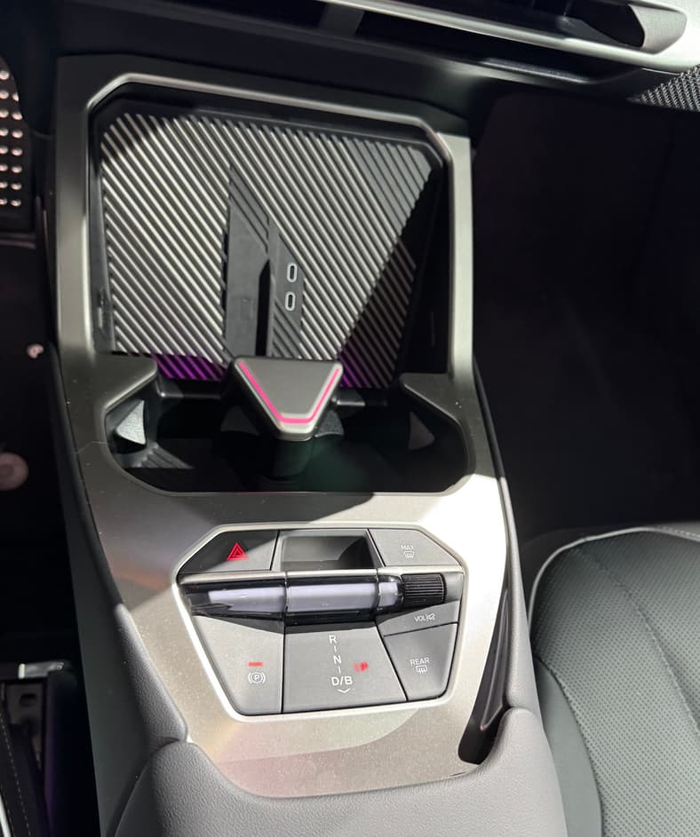 The Open Center Console In The Bmw Ix3 Includes A New Gear Selector Panel And Wireless Phone Charge Pad