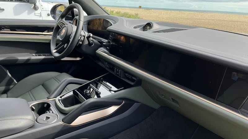 Porsche Cayenne dashboard and grab handles. Photo: Sara Lacey