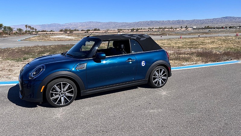 Go Ahead, Get Your Hair Messy. A Luxury Convertible Is Worth It 6 Owning A Manual Mini Cooper Convertible Is Now Officially On My Bucket List. Photo By Allison Bell