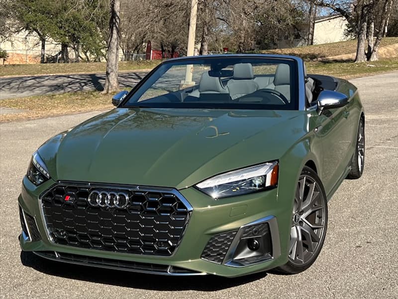Green Audi S5 Cabriolet Convertible With Top Down.