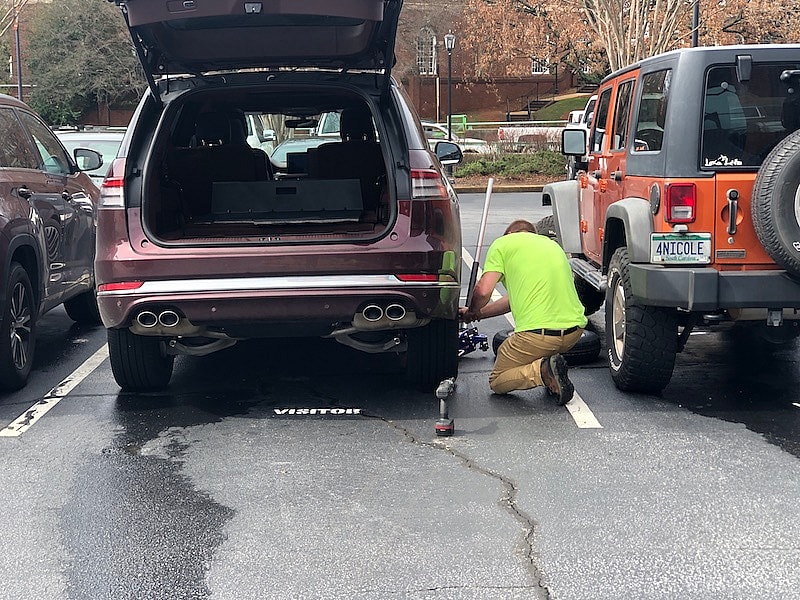 Roadside Assistance Lincoln Car Girl