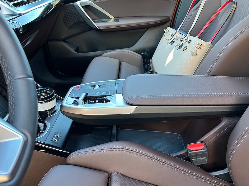 The Cantilevered Arm Rest Creates A Bit Of Open Storage Space Beneath