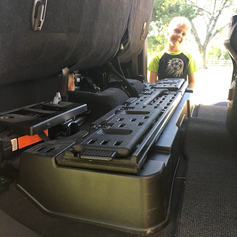Storage bins under the seats hold the jack and any tools you might need!