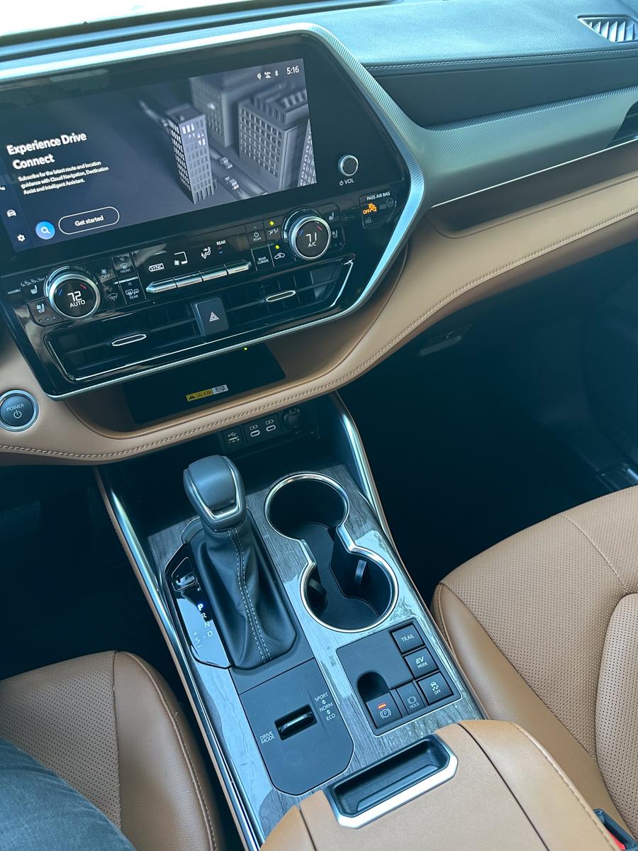 Driving the 2024 Toyota Highlander Hybrid Brought Pleasant Memories Back to the Surface 3 The Center Console Of The 2024 Toyota Highlander Hybrid With All The Knobs And Switches For Ease Of Use