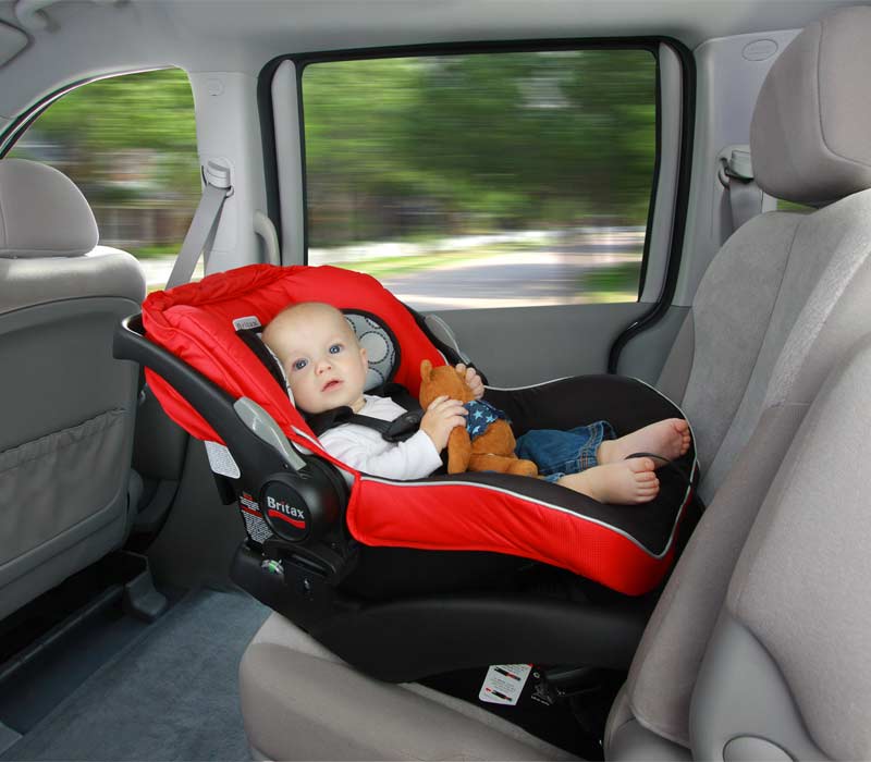 Baby in carseat in back of car