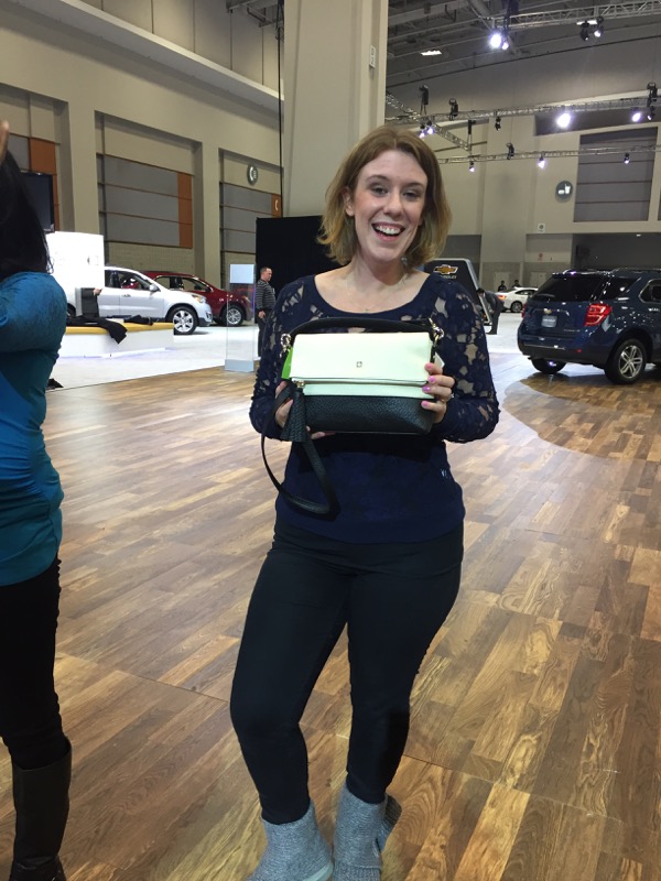 Ashley Saunders was thrilled with her new Kate Spade handbag!