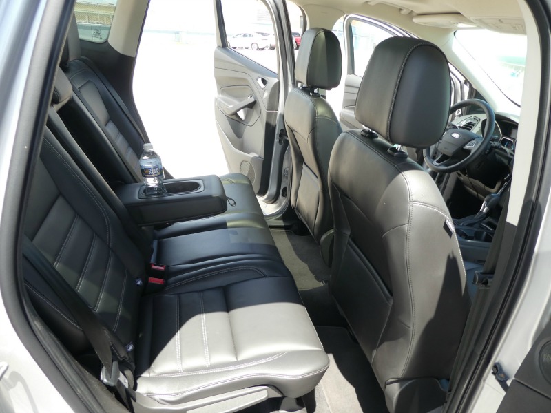 Rear climate control, cup holders & space add comfort for passengers on a long road trip