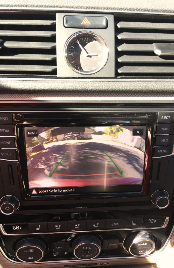 The analog clock adds an old fashioned charm to the dash of the 2017 VW Passat.