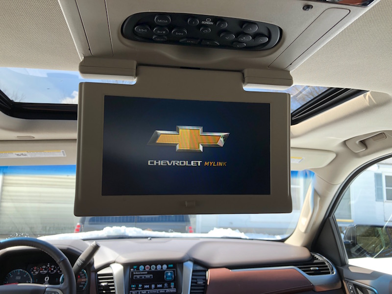 Keep the kids entertained with a shared video screen, headphones included. Chevy Tahoe