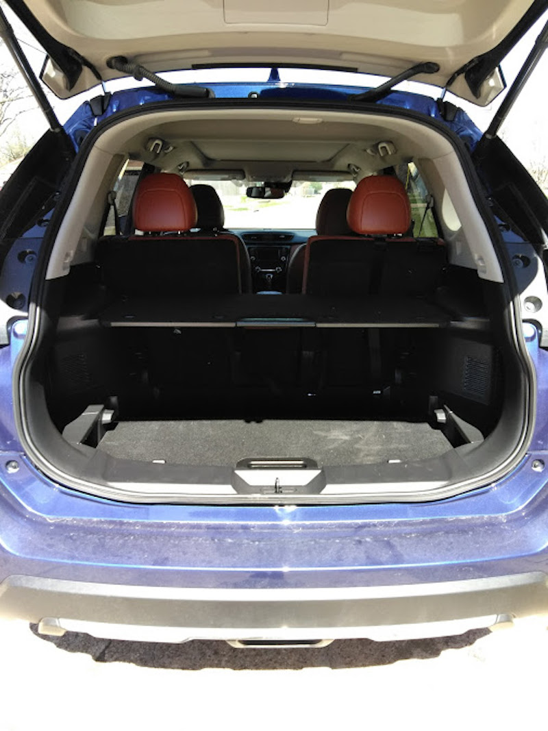 storage solutions in the trunk of a blue rogue.