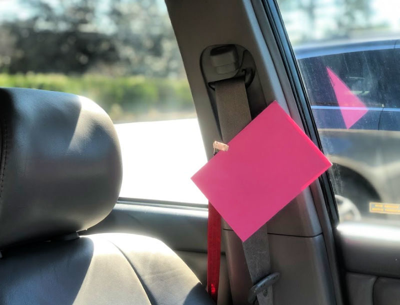 Keep them safe and loved by clipping a Valentine's Day car surprise to the searbelt. Photo Credit: Kendra Pierson