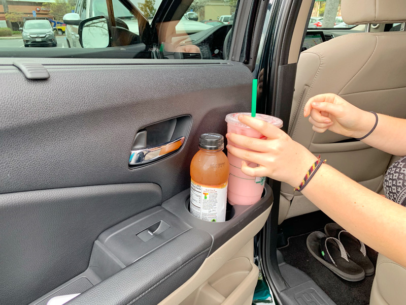 Drinks in cupholders.
