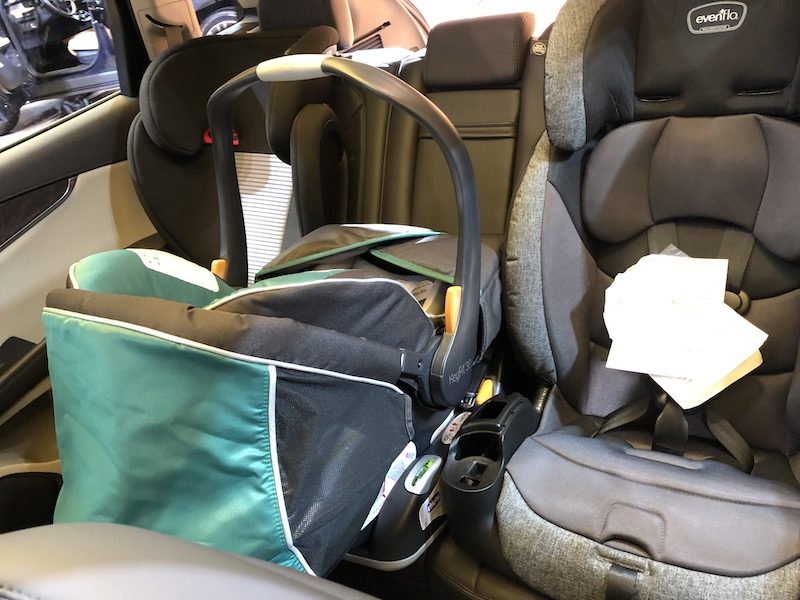 two child car seats inside the Lincoln Corsair