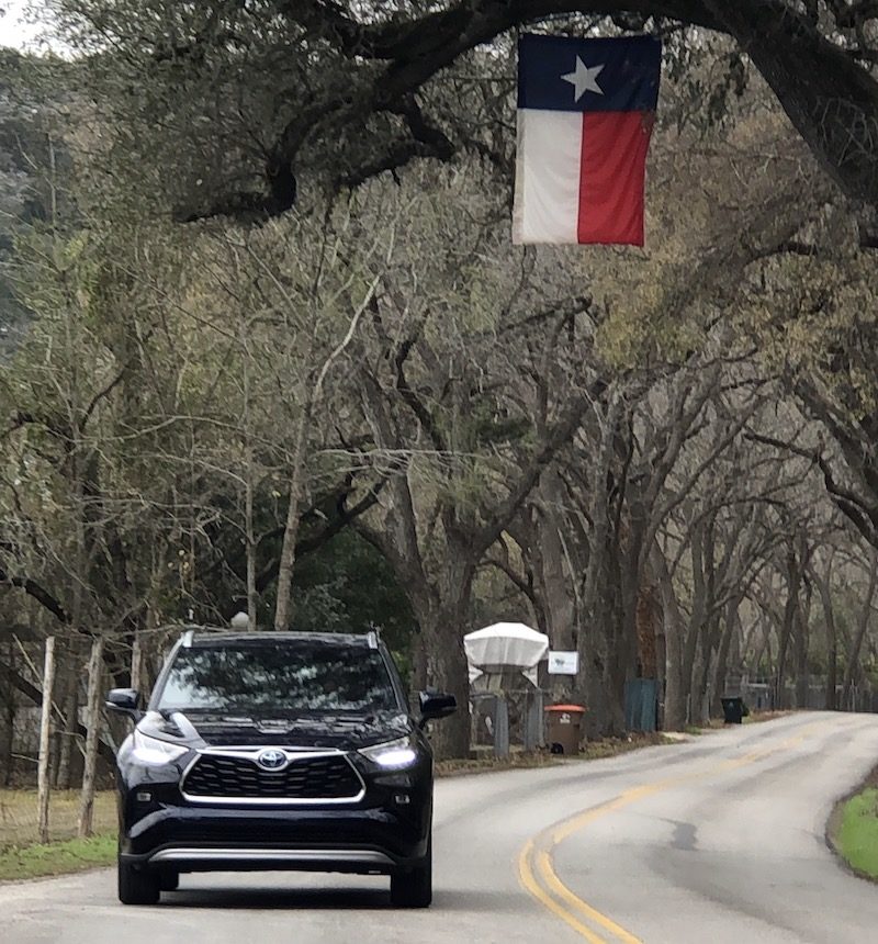 2020 Toyota Highlander driving on the road