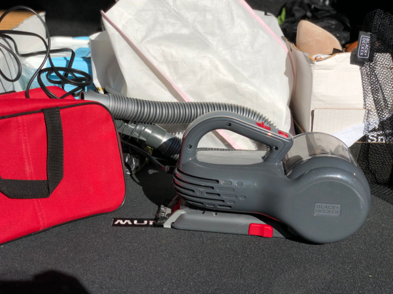 I own a portable vacuum. With children in my car or even my husband, I find having a car vacuum is a must. It takes care of crumbs as well as dried up mud or dust that can accumulate. 