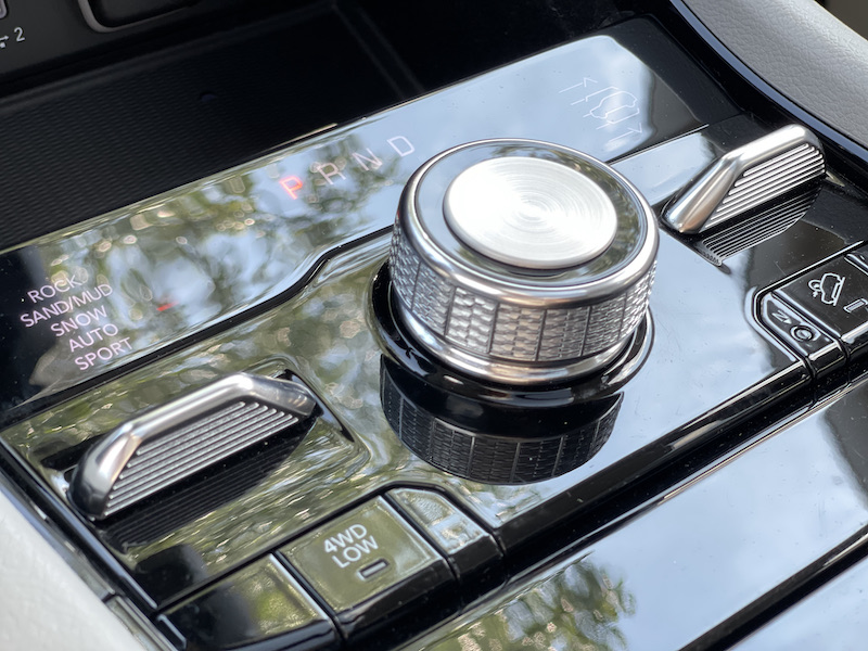 The gear selector sits at the center of the Jeep Grand Cherokee L's command center; in textured metal and glass, it's an elegant thing to hold