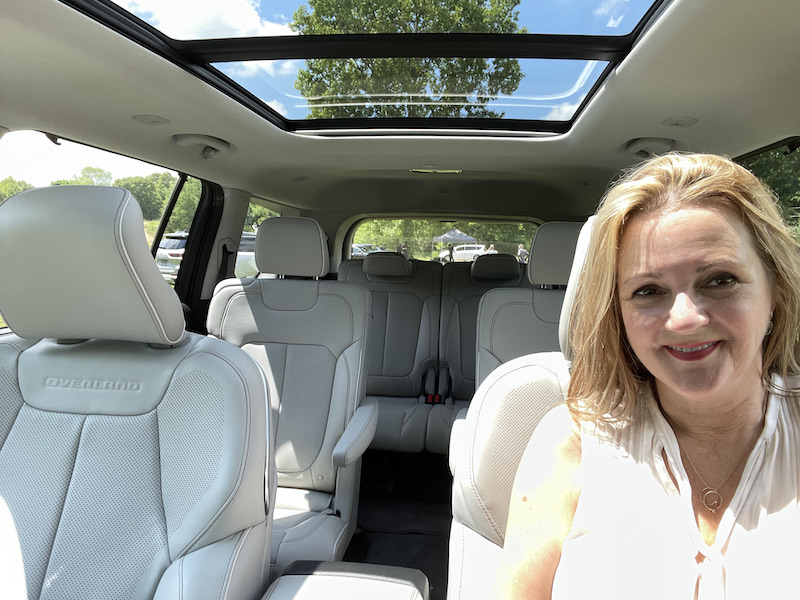 The panoramic sunroof and light grey interior in the Overland model I test drove