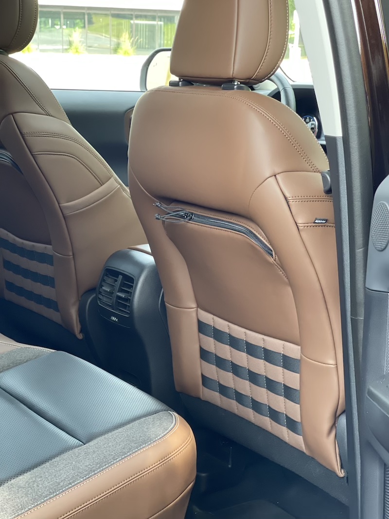 Seat backs in the Ford Bronco Sport have zip pockets and a stretch lattice panel perfect for holding small items