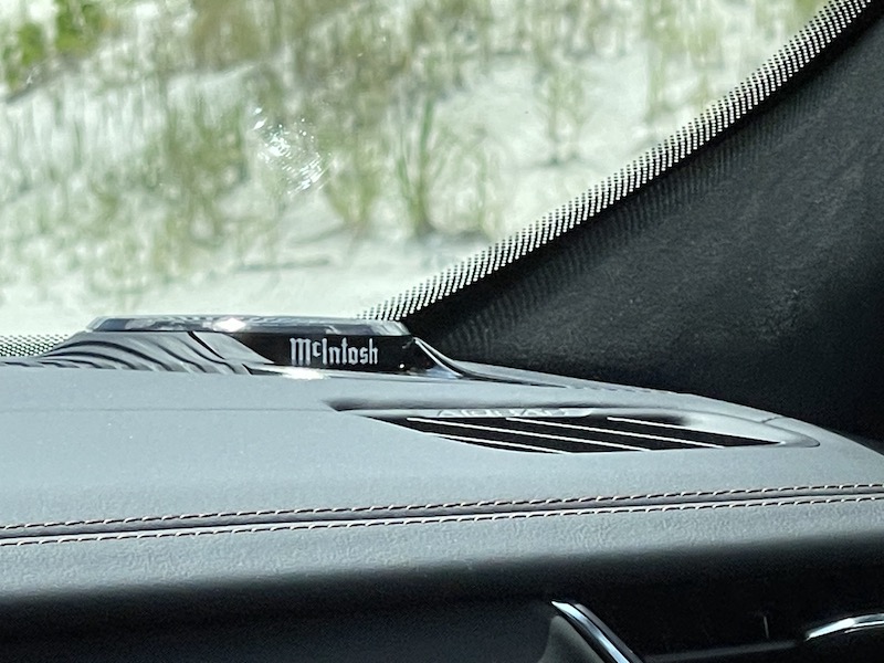 The McIntosh premium sound system speakers frame the dash of the Jeep Grand Cherokee L
