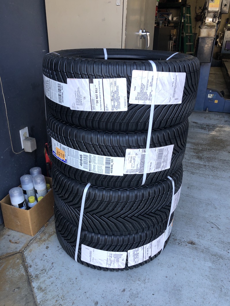 The bundle of Michelin CrossClimate2 tires waiting for installation
