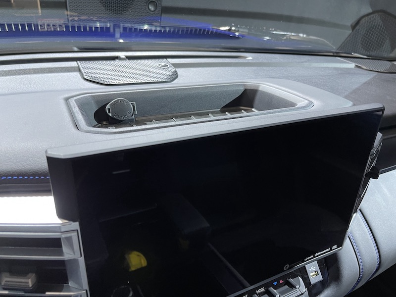 The ONLY cigarette adapter power port is on the dashboard behind the touch screen. Photo: Scotty Reiss