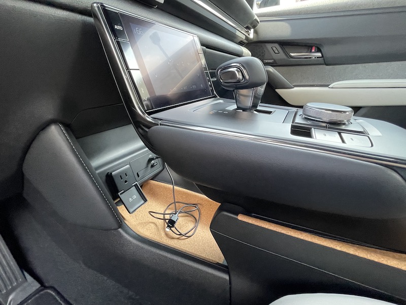 Another look at the floating center console and underneath, the cork-lined cubby