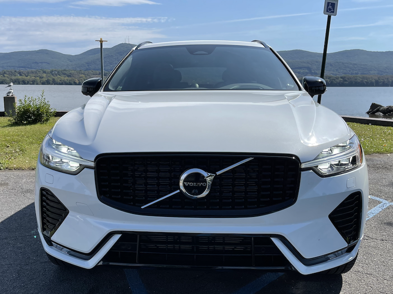 The front end of the 2022 Volvo XC60 has an updates lower grille and air vents; the badge is heated to keep sensors working in messy winter weather