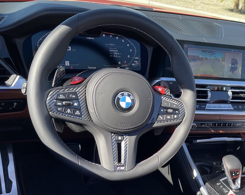 Driver assist features are accessed on the steering wheel