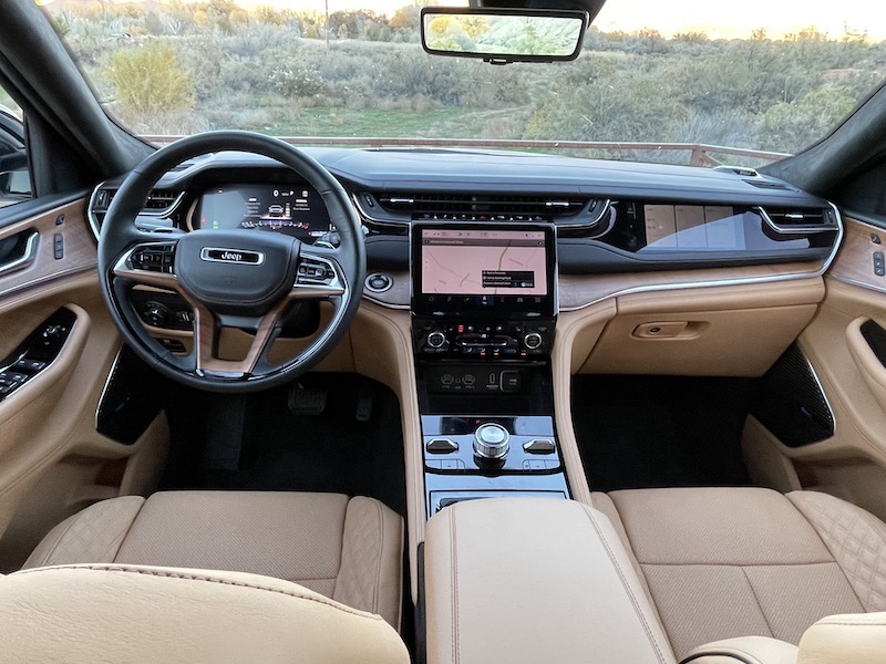 The front seat of the Jeep Grand Cherokee; this color is called Tupelo Honey and it is very sweet