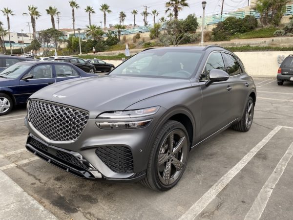 Genesis GV70 exterior with palm trees. Photo by Sara Lacey