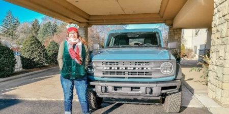 Woman standing in front of Ford Bronco Black Diamond